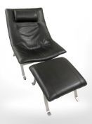 A contemporary Danish black leather and aluminium lounge chair with matching footstool