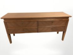 A 20th century Danish teak veneered sideboard,