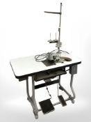 A Yamato industrial sewing machine in table,