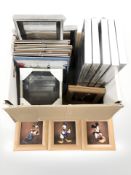 A group of modern picture frames, assorted continental framed prints.