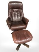A Burgundy leather swivel armchair on bentwood support with matching footstool