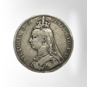 A Victorian 1889 silver crown.