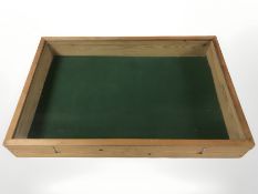 A glazed pine tabletop display cabinet, 60 cm x 40 cm.