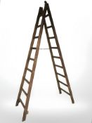 A large folding pine step ladder,