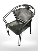 A pair of wire metal garden chairs
