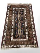 A Balouch rug, Afghanistan, 195 cm x 114 cm.