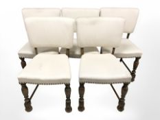 A set of five oak dining room chairs