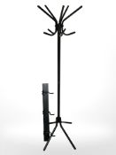 A metal coat rack and a hat and coat stand