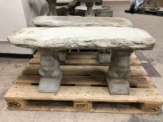 A garden seat with squirrel supports