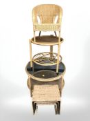 A 20th century wicker and glass two tier coffee table, diameter 83 cm,