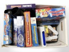 A quantity of board games, Zone40 wireless gaming console, playing cards, etc.