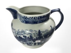 A Victoria Ware ironstone blue and white jug, height 23 cm.