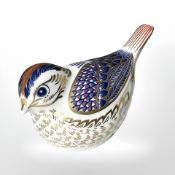 A Royal Crown Derby Goldcrest paperweight with silver stopper.