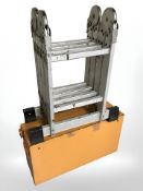 An enamelled metal tool chest and a folding aluminium ladder
