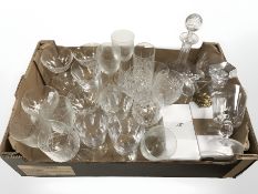 An assortment of crystal wine glasses, two decanters, etc.