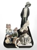 Two glass quartz mantle tmepieces, and a group of pottery figurines.