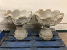 A pair of tulip design garden urns