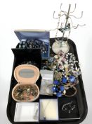 A quantity of costume jewellery, ladies gold plated wristwatches, jewellery stand, etc.
