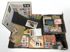 A stamp album and further loose world stamps, Robertsons enameled lapel pins,