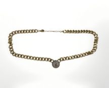 A gold plated flat link necklace with pendant,