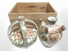 Two antique Georg Schmider pottery vases, one in the Crocus pattern,