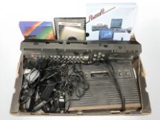 An Amstrad CPC464 64K colour personal computer and an Atari video computer system,