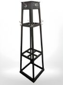 A painted hat and coat stand,