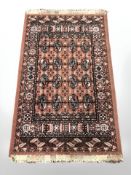 A machine made rug of Iranian design, 160 cm x 97 cm.