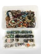 Two plastic boxes containing a large quantity of mixed costume jewellery, bead necklaces, pendants,