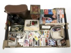 A quantity of football trading cards, boxed microscope, pair of Prinz 10x50 binoculars,