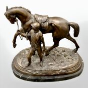 After Edgar Bertram : A bronze statue depicting a jockey with racehorse, on a black marble plinth,