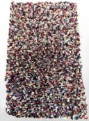 A contemporary clippy rug, 120 cm x 74 cm.