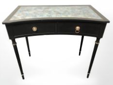 A contemporary ebonised inverted bowfront side table with scumbled and gilt top,