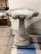A Baluster shaped bird bath