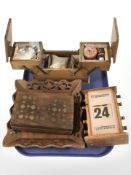 An oak scrolling desk calendar, a concertina work box,