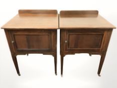 A pair of late Victorian mahogany and satin wood inlaid pot cupboards,
