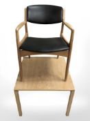 A Danish black vinyl armchair together with a lamp table