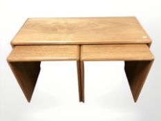 An O'Donnell Ltd teak nest of three tables, width 90 cm.