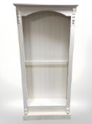 A painted pine open bookcase, 91 cm x 31 cm x 200 cm.