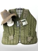A Barbour padded jacket, size L, together with a Barbour repair kit,