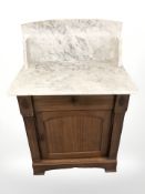 A 19th century continental mahogany marble topped washstand, 71 cm x 49 cm x 109 cm.