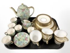 Twenty pieces of Aynsley gilded tea china and fourteen pieces of Empire Ware floral decorated