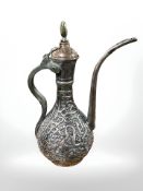 A 19th century Bahrain copper plated coffee pot, height 39 cm.