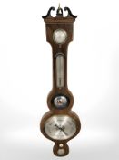 A mahogany barometer with silvered dial, signed Peverelli, Birmingham.