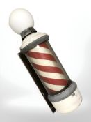A barbershop pole mounted on bracket, length 100 cm.