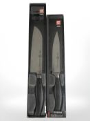 Two Zwilling chef's knives.