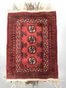 A Turkoman rug, Afghanistan, 90 cm x 57 cm.