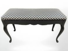 A painted storage duet stool on cabriole legs,