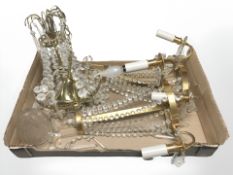 A pair of gilt metal wall sconces with faceted crystal beads, a further pendant light fitting,