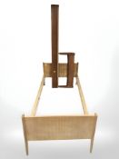 Two Danish teak single bedframes, inner width approximately 32 inches.